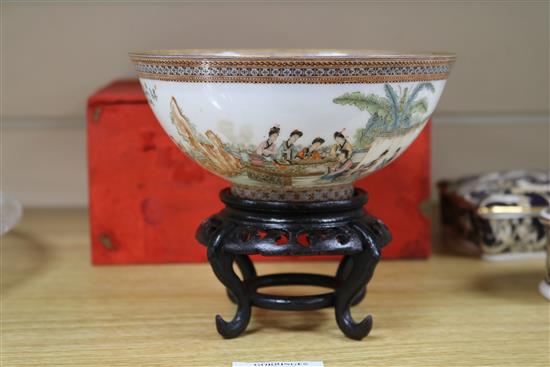 A Chinese egg shell porcelain bowl, wood stand and box